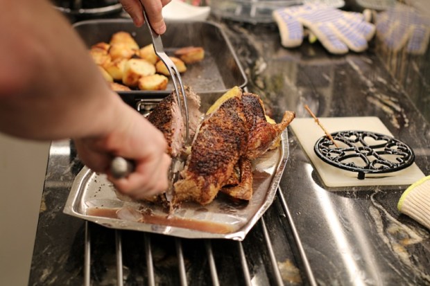 Carve the duck and remove everything from the inside