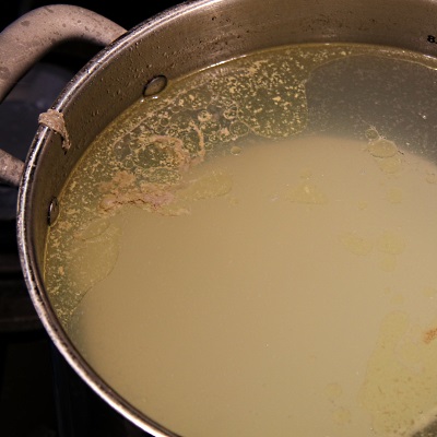 Scum forms in the stockpot