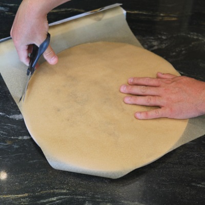 Cut out a template for the baking stone