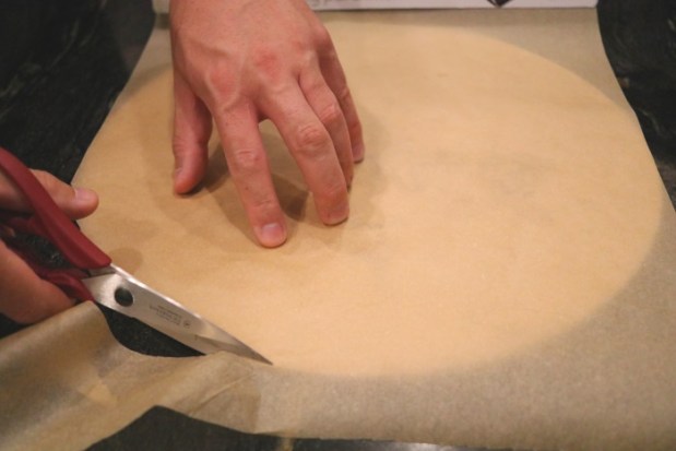 Cut out a template of baking parchment