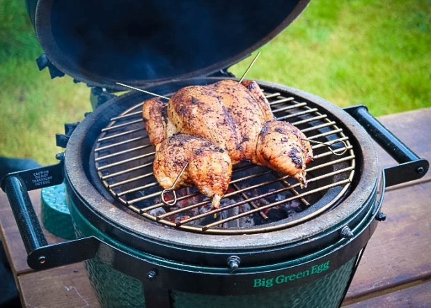 Spatchcock chicken cooking on a Minimax
