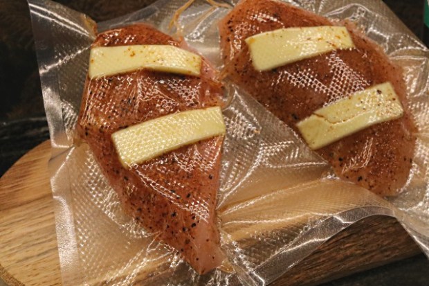 Chicken breast with a rub and butter sealed and ready
