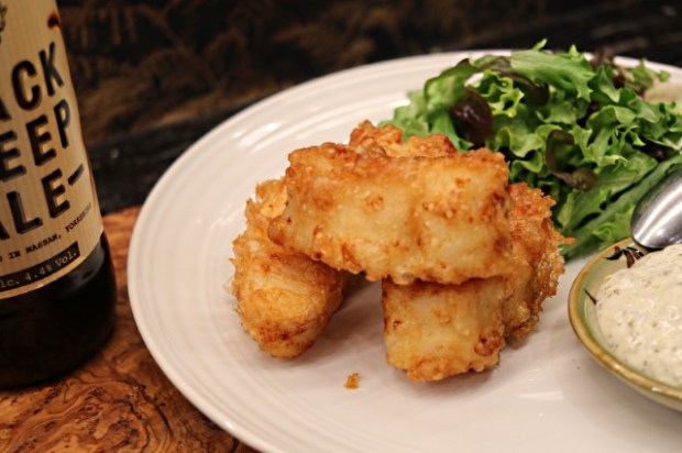 Battered goujon served with tartar sauce and salad