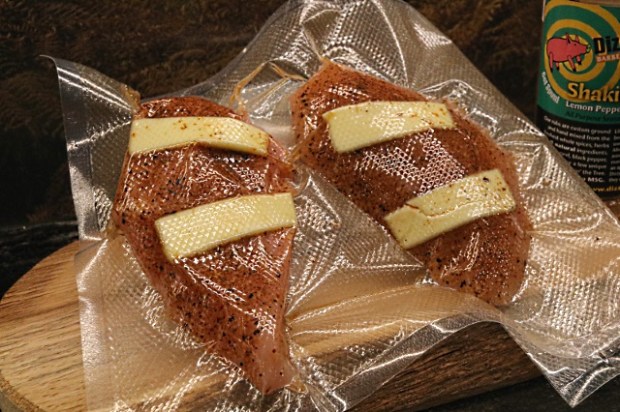 Chicken breast with Dizzy Pig rub and butter strips vacuum sealed