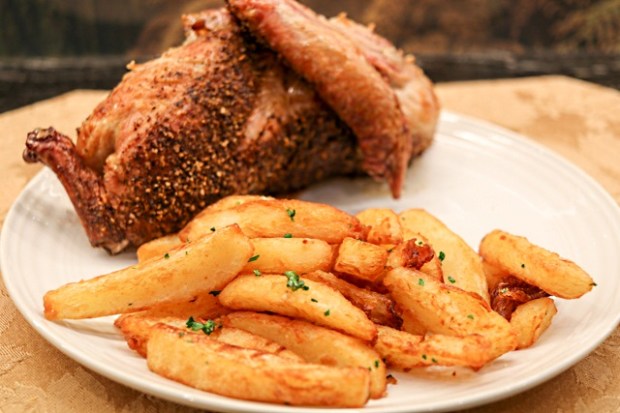 Truffle and parsley chips served with roast duck rubbed with Dizzy Pig Game On