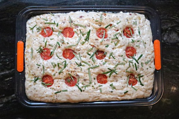 Focaccia with tomatoes and rosemary added just before baking