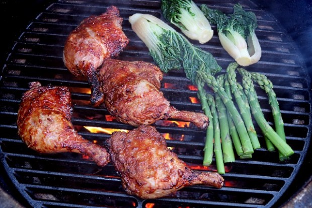 Duck legs, pak choi and asparagus ready to be seared