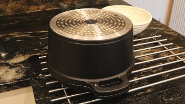 Casserole dish base placed on top of lid