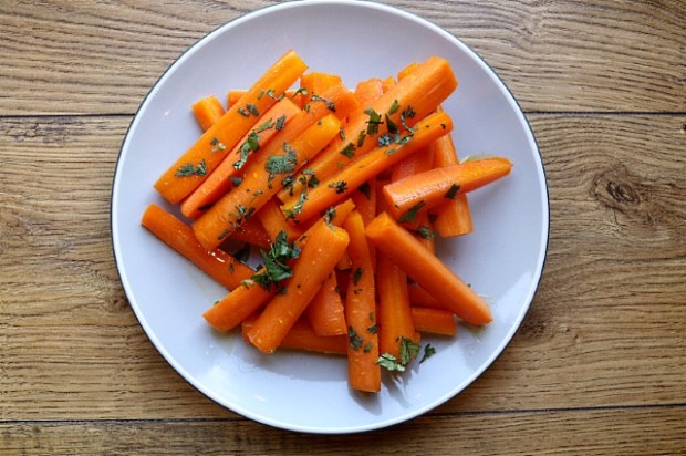Honey glazed carrots with cumin served as a shared side dish