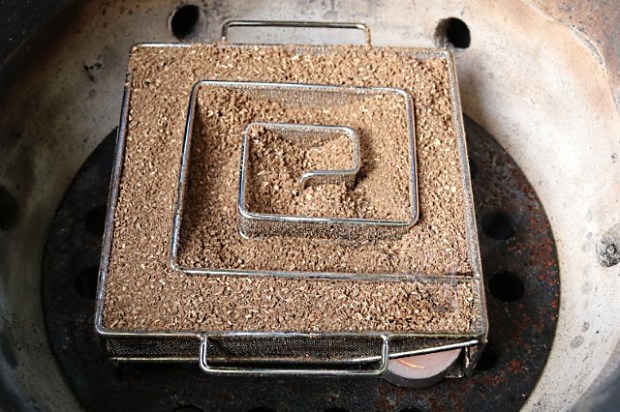 The ProQ smoker lit and start to generate smoke