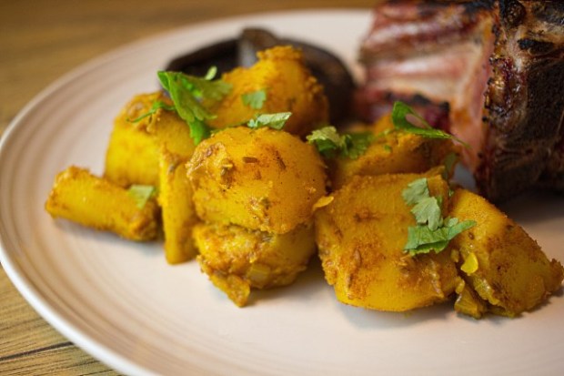 Aloo jeera garnished with freshly chopped cilantro