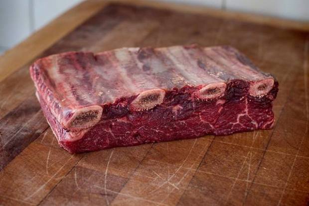 A rack of four beef short ribs