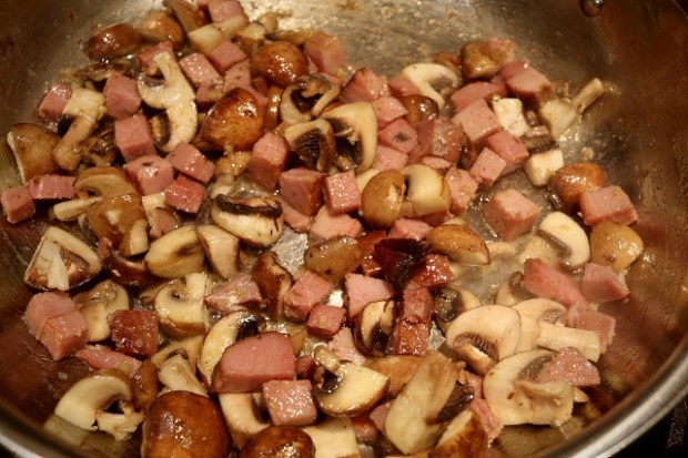 Ham and mushrooms cooking before adding the pasta