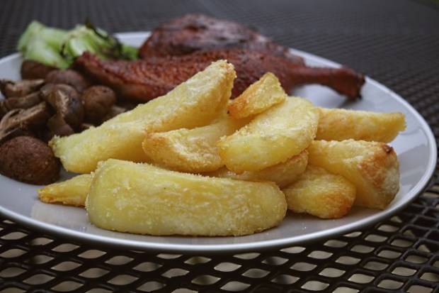 Ramos potato wedges served with roast duck and pak choi