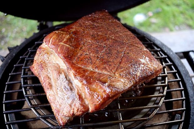 Pork ribs after two hours of smoking over orange wood