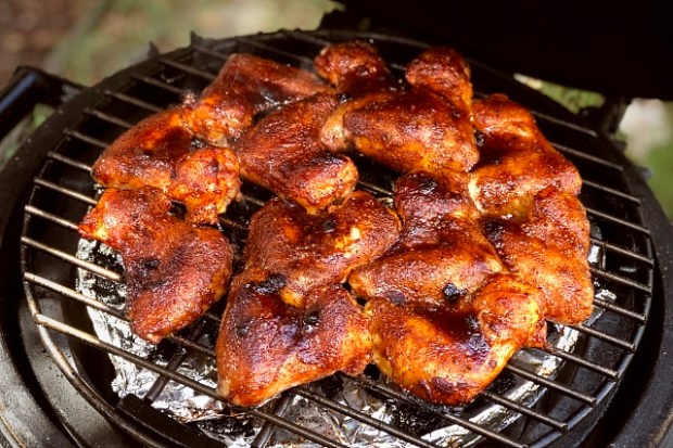 Huckleberry glazed chicken wings cooking in a Minimax
