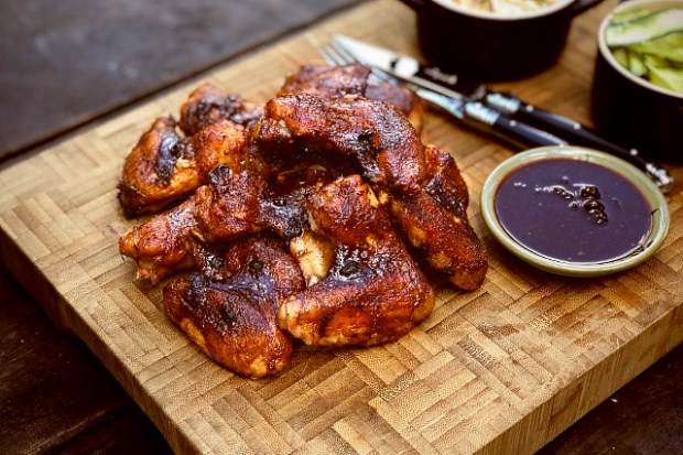 Huckleberry glazed chicken wings served