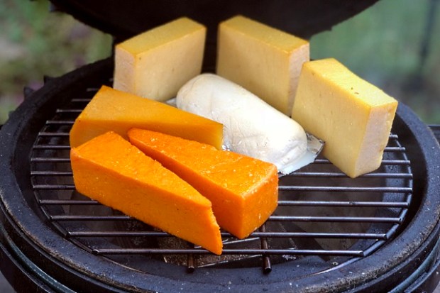 Smoking the Red Leicester, cheddar and mozzarella over apple