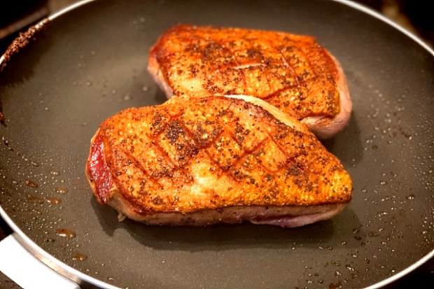 Duck breast frying to render out the fat