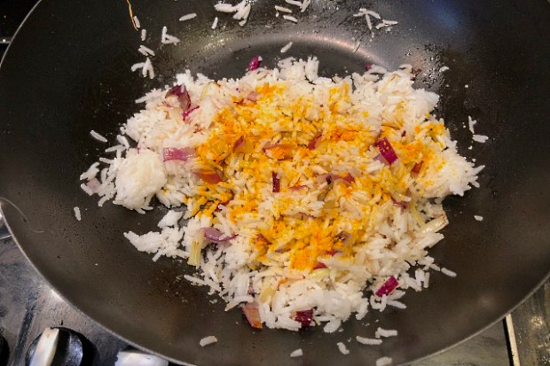 Turmeric added to the rice for colour