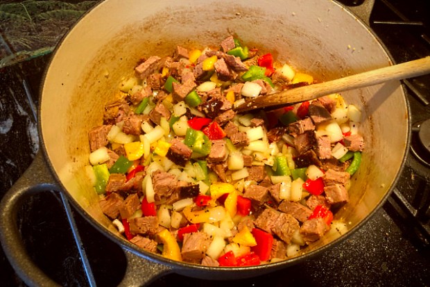 Searing the ingredients in the Dutch oven