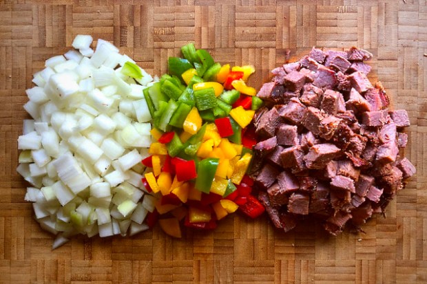 Onion, peppers and brisket cut up and ready to cook