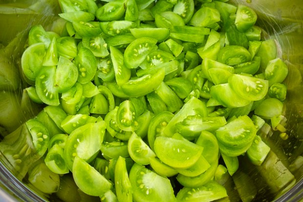 Chopped and sliced tomatoes mixed up in a bowl