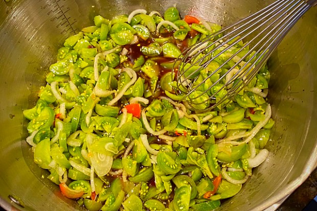 Stirring the ingredients together whilst simmering
