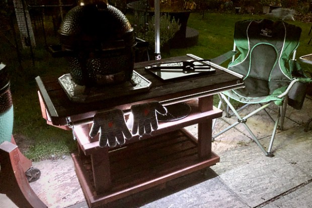 White undercounter lighting with a Big Green Egg chair