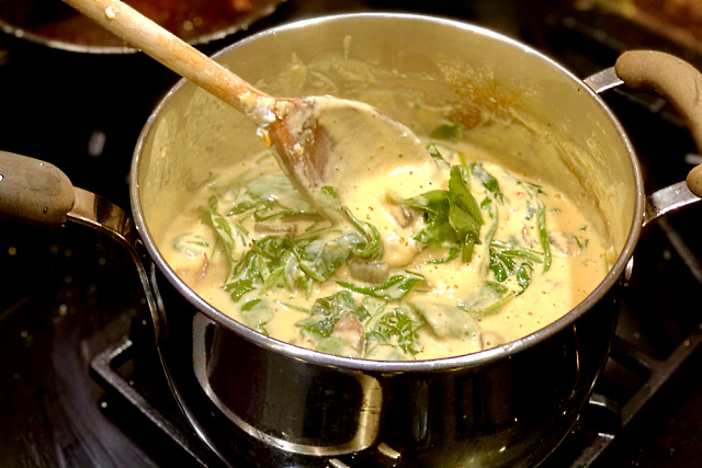 Stirring in the spinach