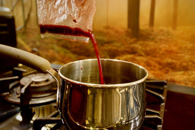 Pouring juices from the vac seal bag into the gravy